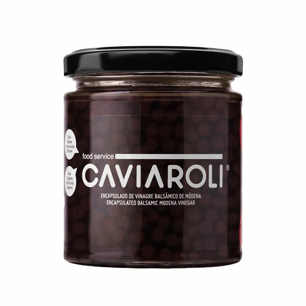 Aceto di Modena Perle Gourmet per Condimento o Decorazione vaso 200gr. Sfere di aceto di Modena contenute nel suo interno liquido esplodono in bocca al morso. Colore scuro, sapore di aceto di Modena.